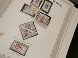 a book with stamps on it sitting on a table