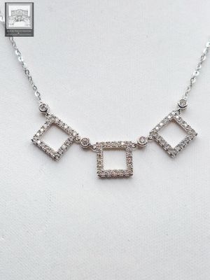 Collier en or blanc 750°/.(18K), orné de motifs géométriques…