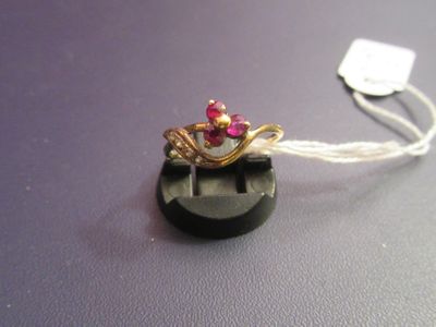 a ring that is sitting on top of a button