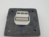 a white electrical outlet on a white surface
