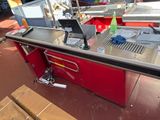 an image of a workbench with a laptop on it