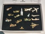 a box that has a bunch of pins in it