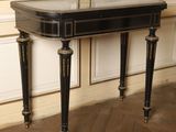 a black table with a marble top in a room
