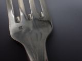 a fork that is sitting on top of a table