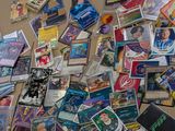 many different types of cards scattered on the floor