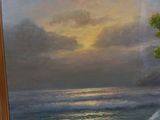 a picture of a painting of a sunset over the ocean