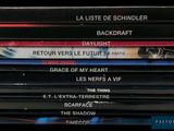 a lot of dvds stacked on top of each other