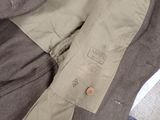 a close up of a jacket with a button on it