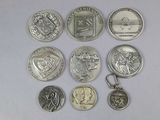a lot of coins that are sitting on a table