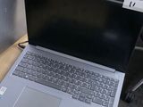two laptops that are sitting on a desk