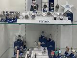 many watches on display in a glass case