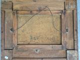 a picture of a wooden frame with a picture on it