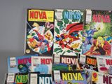 a lot of comic books sitting on a table