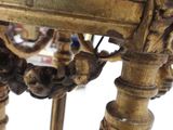a close up of a table with a clock on top of it