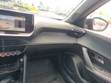 a car dashboard with a monitor in the middle of it