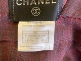 a label on the back of a chanel jacket