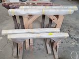 several pieces of wood sitting on top of a table in a room