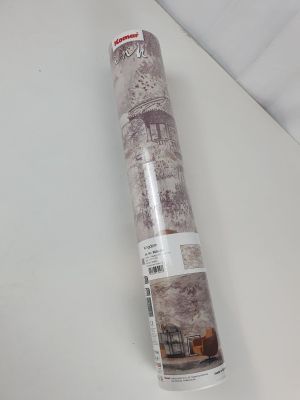 a close up of a roll of paper on a white surface