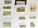 a lot of paintings hanging on the wall of a room
