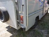 a trailer that has a trailer attached to the back of it