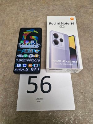 a box of redmi note 14 and a white box of redmi note 14