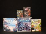 a lot of video games sitting on a black table