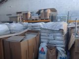 a room with a lot of boxes and boxes on the floor