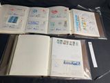 a lot of books that are open on a table