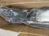 a cardboard box with a plastic bag on top of it