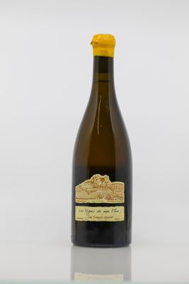 a bottle of wine that is sitting on a table