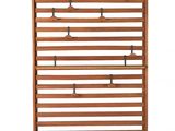 an image of a wooden rack with several bottles on it