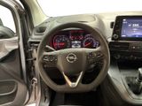 the interior of a car with a steering wheel, dashboard, and dash board