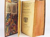 an old book opened to show the inside of it