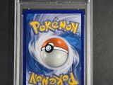 a close up of a pokemon card on a table