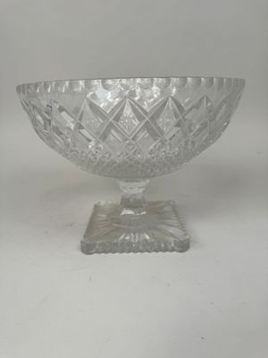 an image of a clear glass bowl with a base on a white background