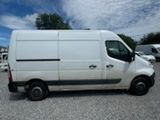 a white van that is parked in a parking lot