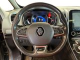 the interior of a car with a steering wheel and dashboard controls
