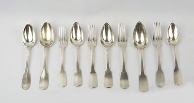 six silverplated spoons and six forks on a white surface