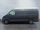 a black van that is parked in a parking lot