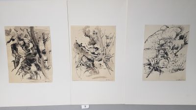 three paintings on the wall of a room with a bed