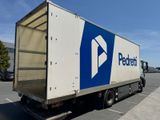 a delivery truck that is parked in a parking lot
