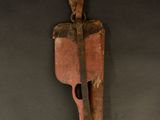 an old wooden knife with a rusty handle