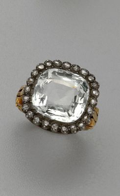 Bague en or jaune 18K (750/oo) centrée d'une aigue-marine ca…