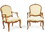 pair of louis xv style walnut armchairs