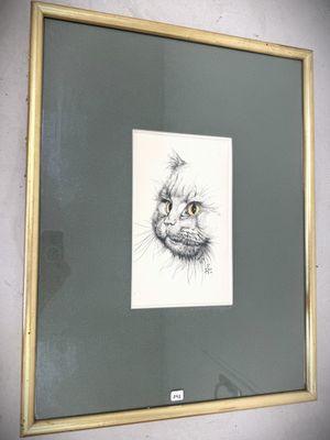 a picture of a drawing of a cat hanging on a wall