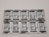 several hard drives stacked on top of each other on a table