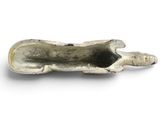 a silver object that is sitting on a white surface