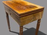 an image of a small wooden table with a drawer on top of it