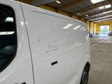 a white van that is parked in a building