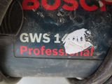 a close up of a bosch power tool on a table